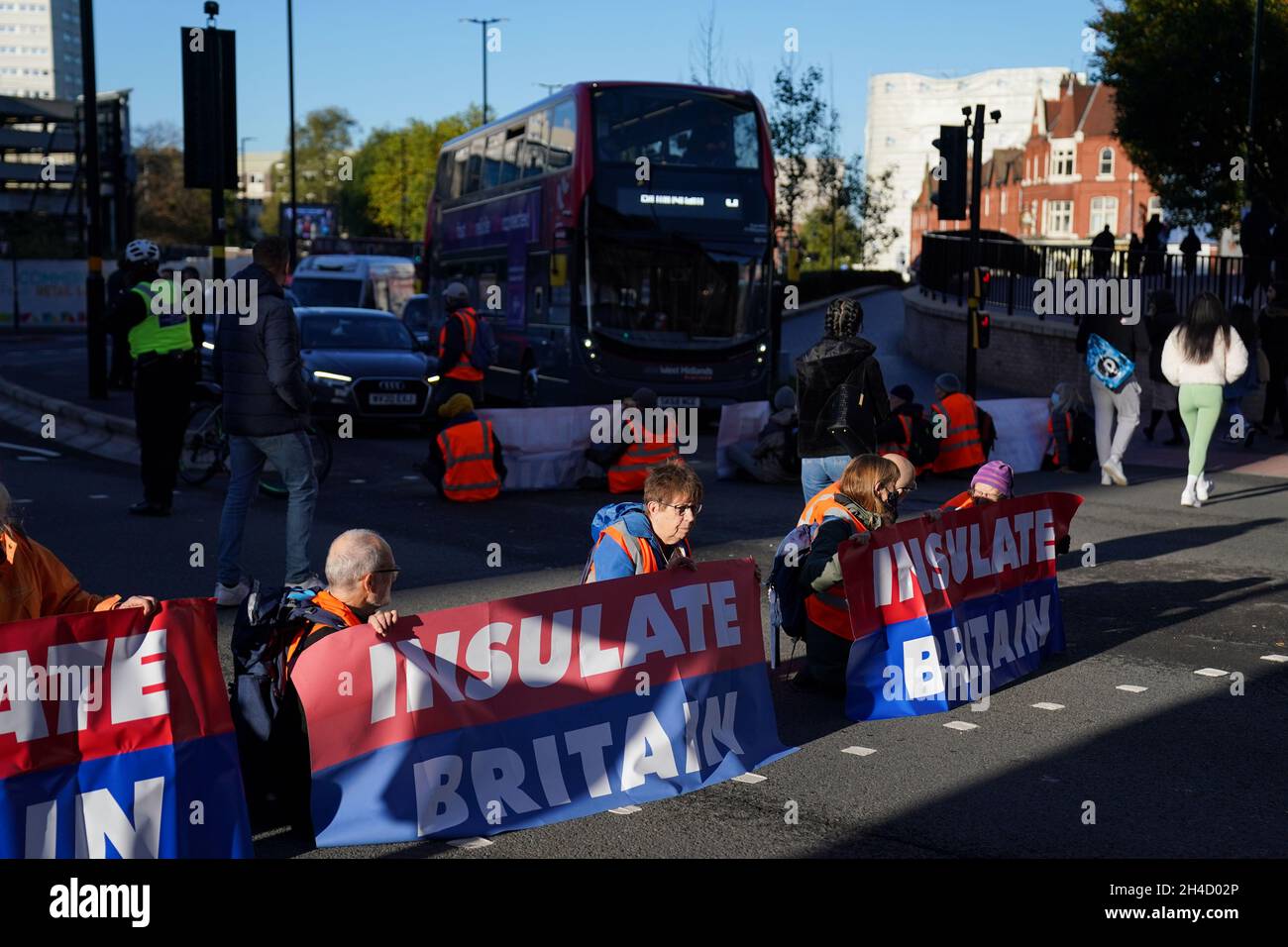 Protesters from Insulate Britain blocking Great Charles Street Queensway in Birmingham. Picture date: Tuesday November 2, 2021. Stock Photo