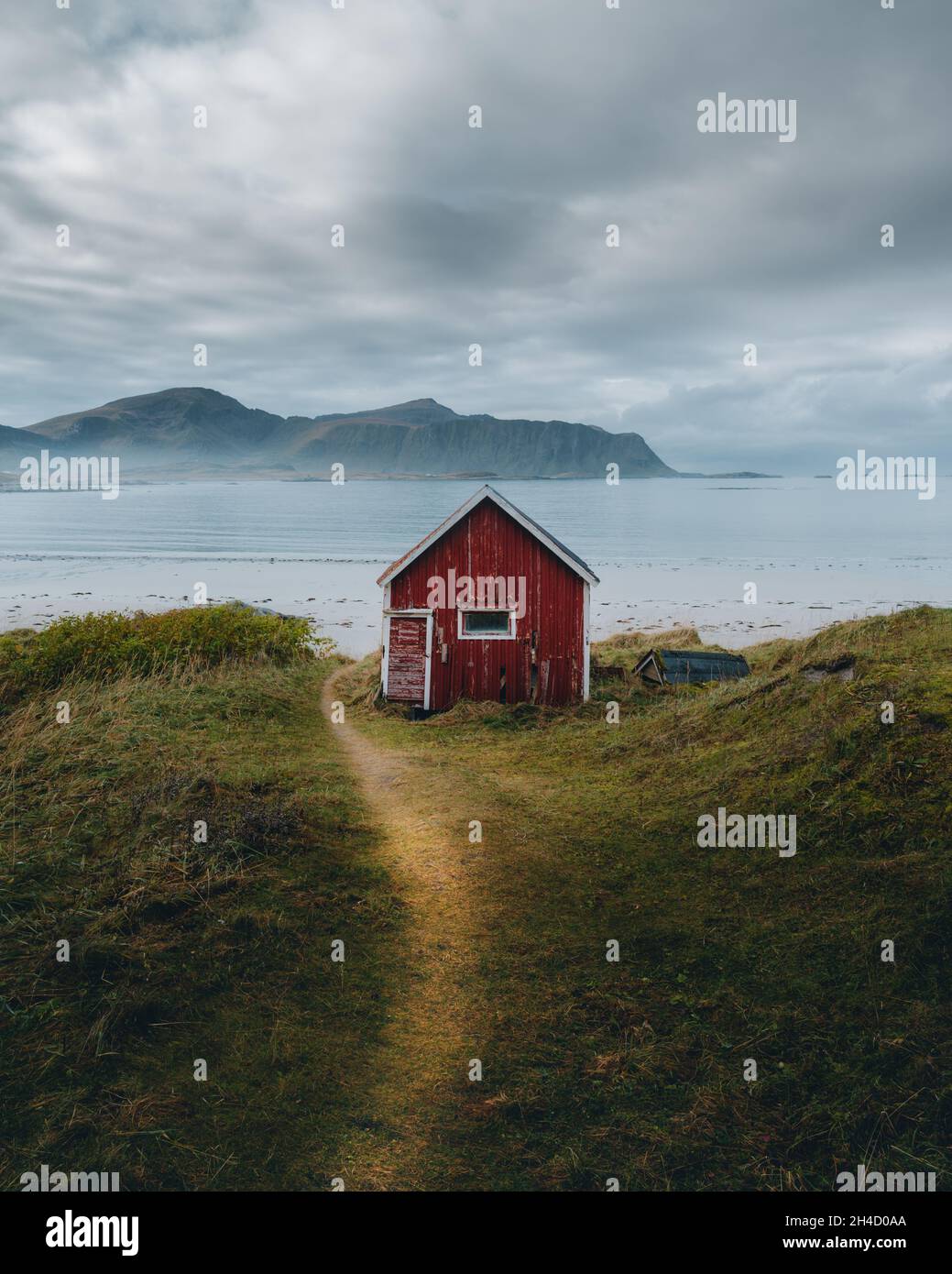 A typical red and colorful cottage of the Norwegian culture and architecture in Norway  Stock Photo