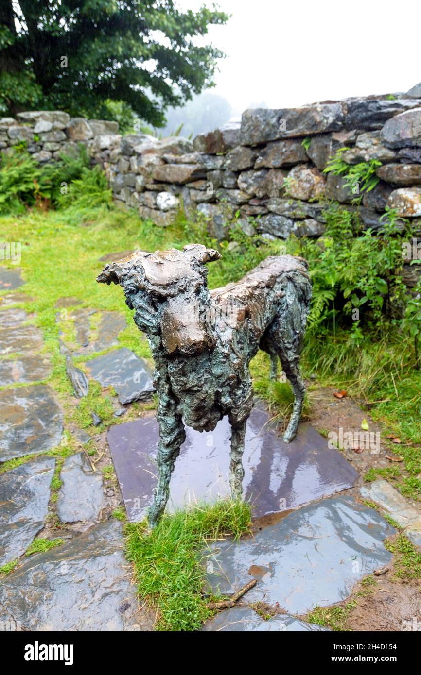 Bronze sculpture of the dog Gelert, placed in a ruined cottage near Gelert's Grave, Beddgelert, Snowdonia National Park, Gwynedd, Wales, UK Stock Photo