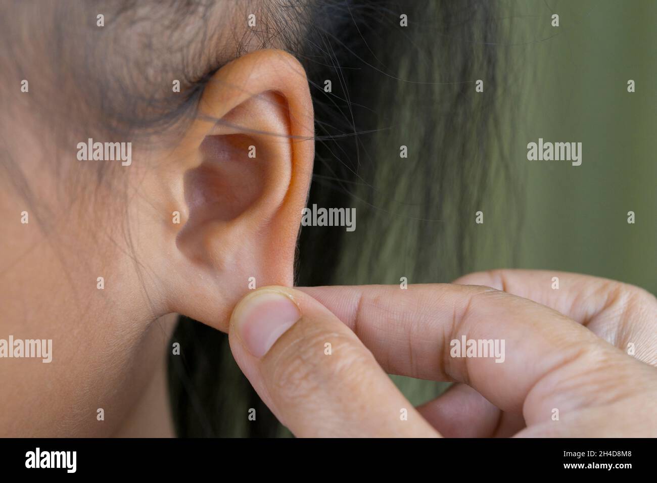 Ear child pulling hires stock photography and images Alamy