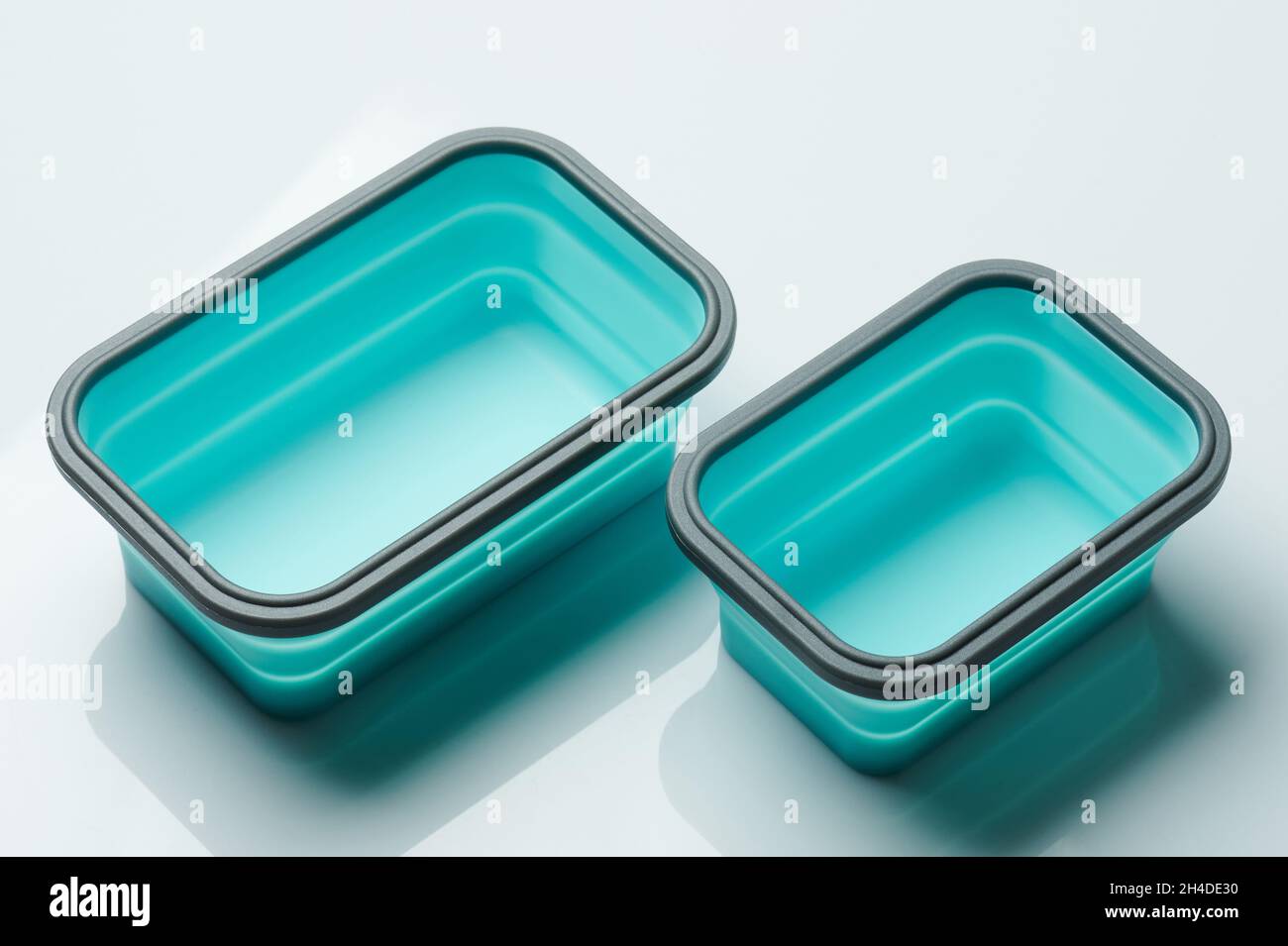 Two open clean lunch boxes isometric  isolated on white background Stock Photo