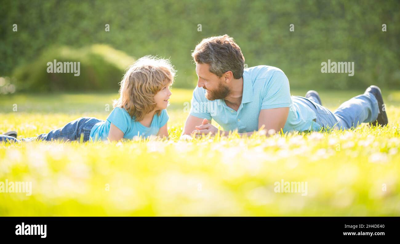 happy father and son having fun in park. family value. childhood and parenthood. Stock Photo