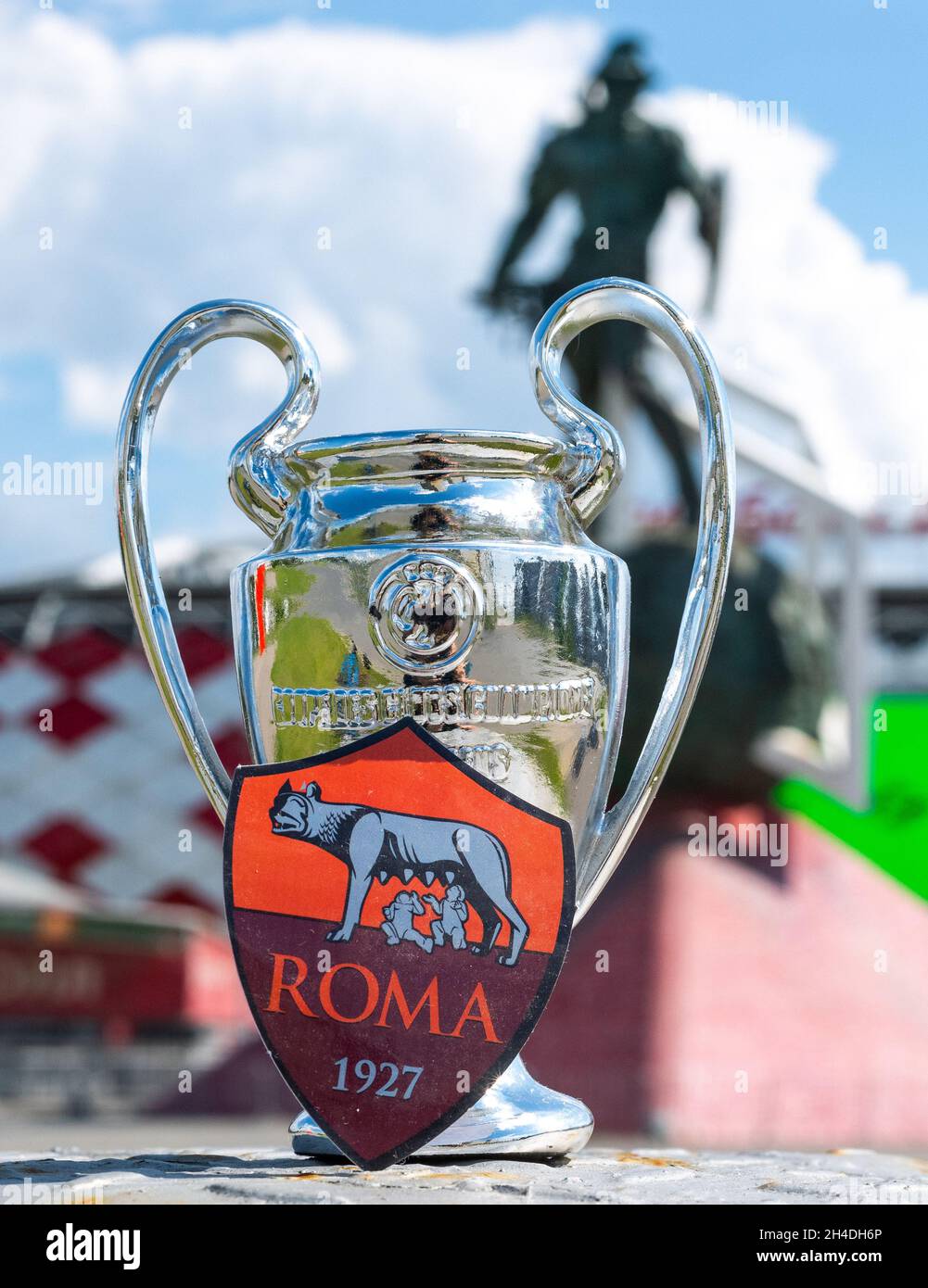 June 14, 2021, Rome, Italy. A.S. Football Club emblem Roma and the UEFA  Champions League Cup against the backdrop of a modern stadium Stock Photo -  Alamy