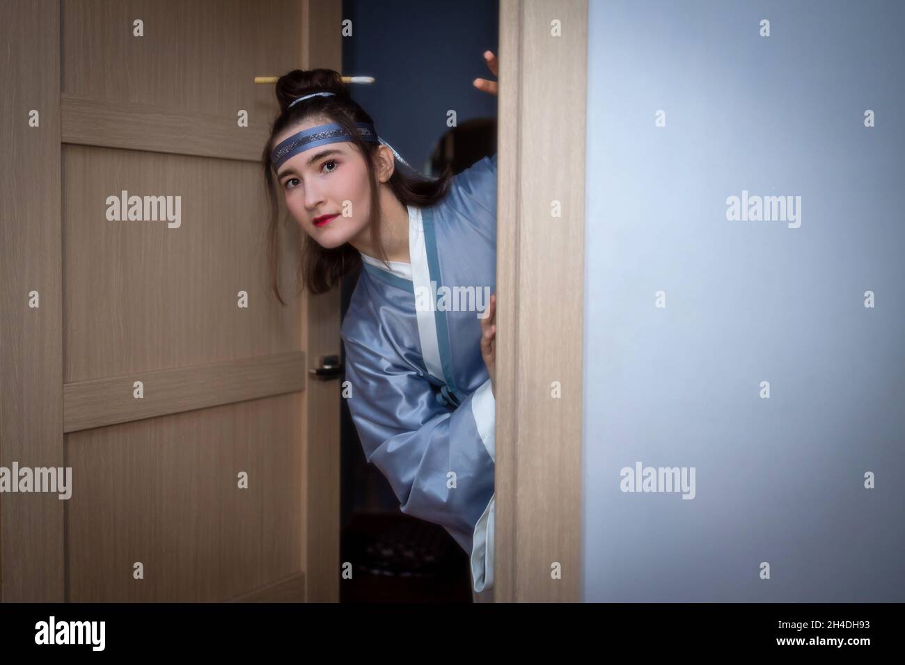 Caucasian woman posing in traditional Chinese hanfu dress. Concept