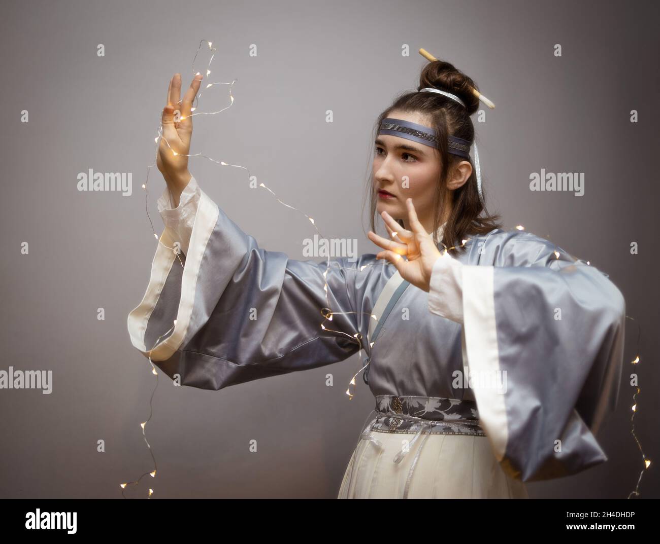 Caucasian woman posing in traditional Chinese hanfu dress. Concept