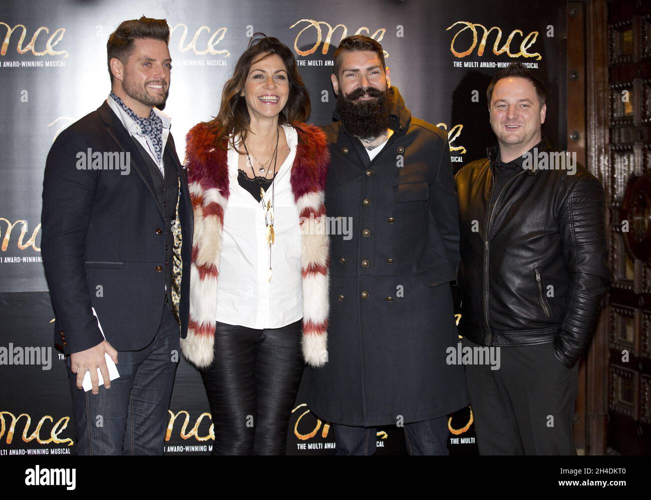 TV Presenter Julia Bradbury with Boyzone members Keith Duffy, left, Mikey Graham, right, and Shane Lynch attend the opening night of Ronan Keating joining the cast of Once the musical Stock Photo