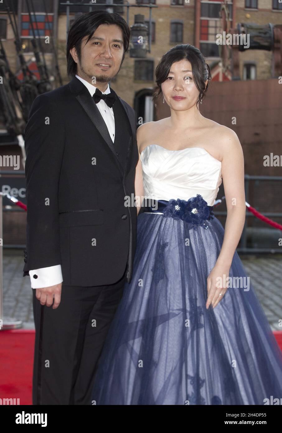 Kazuma Jinnouchi, left, attends the British Academy Games Awards on 7 April 2016, during EGX Rezzed at Tobacco Dock, east London. Stock Photo