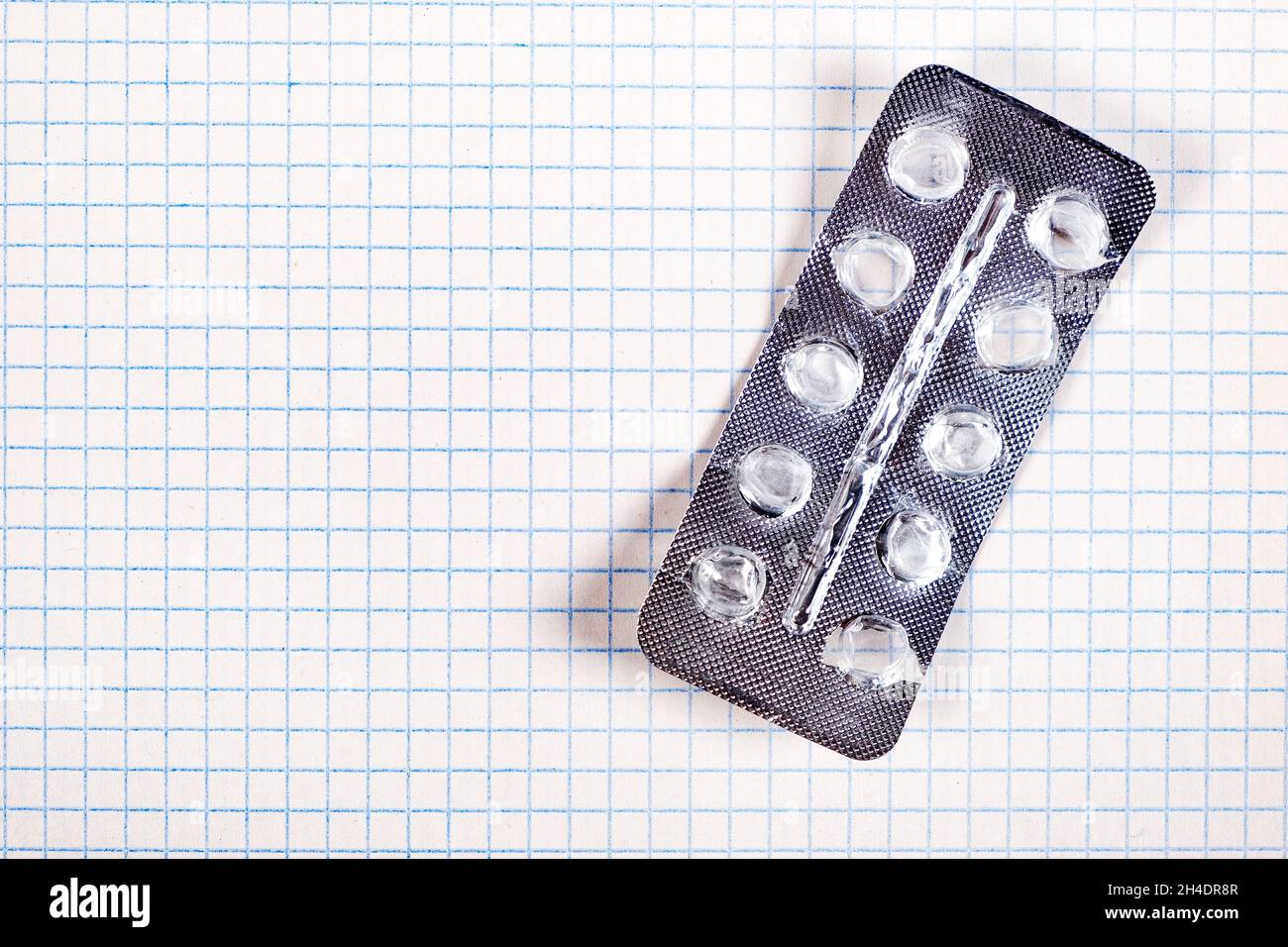 Empty Pack of the Pills on the Paper Background closeup Stock Photo