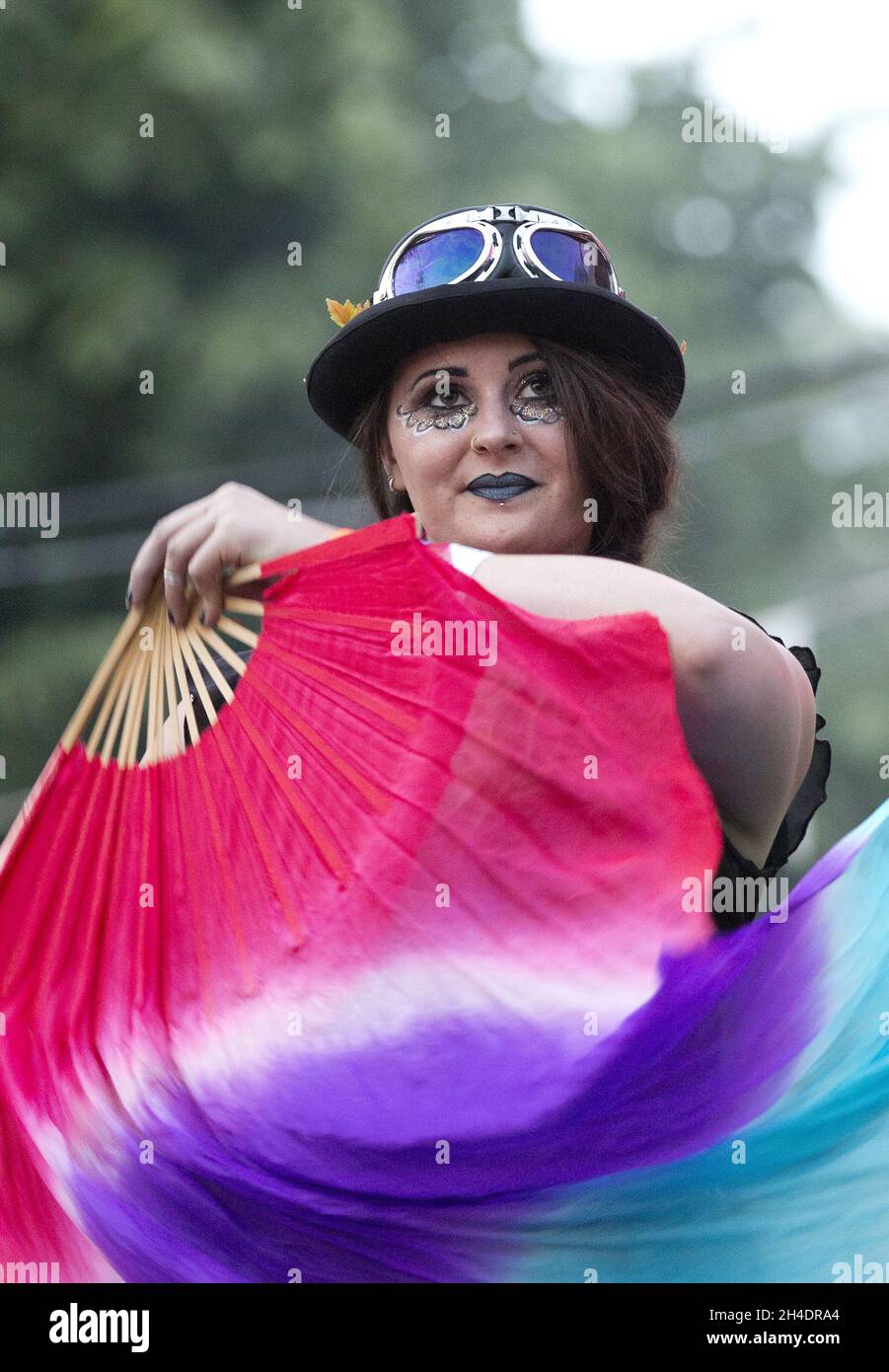 An artist performs in the Circus area at the Isle of Wight Festival, in