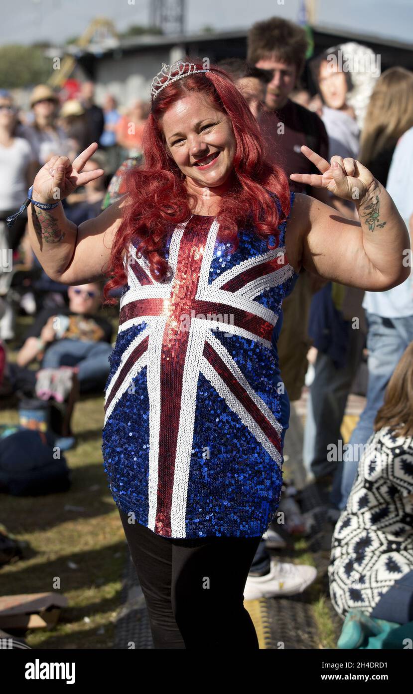 A festival-goer wears an Union Jack dress in the Isle of Wight Festival,  Seaclose Park, Newport, Isle of Wight, on Sunday June 12 Stock Photo - Alamy