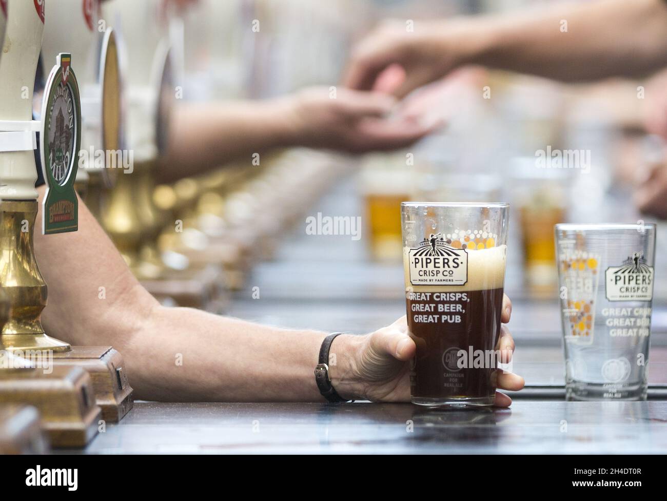 Beer enthusiasts attend the annual Great British Beer Festival 2016 by The Campaign for Real Ale (CAMRA) at Kensington Olympia, west London. Stock Photo