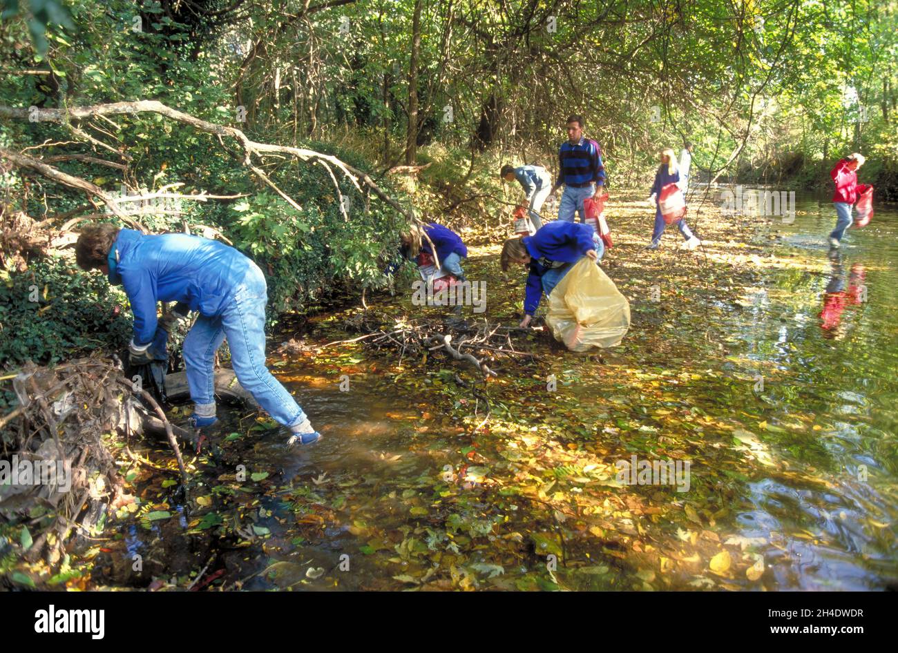 School children and adults participate in a river and stream clean-up ...