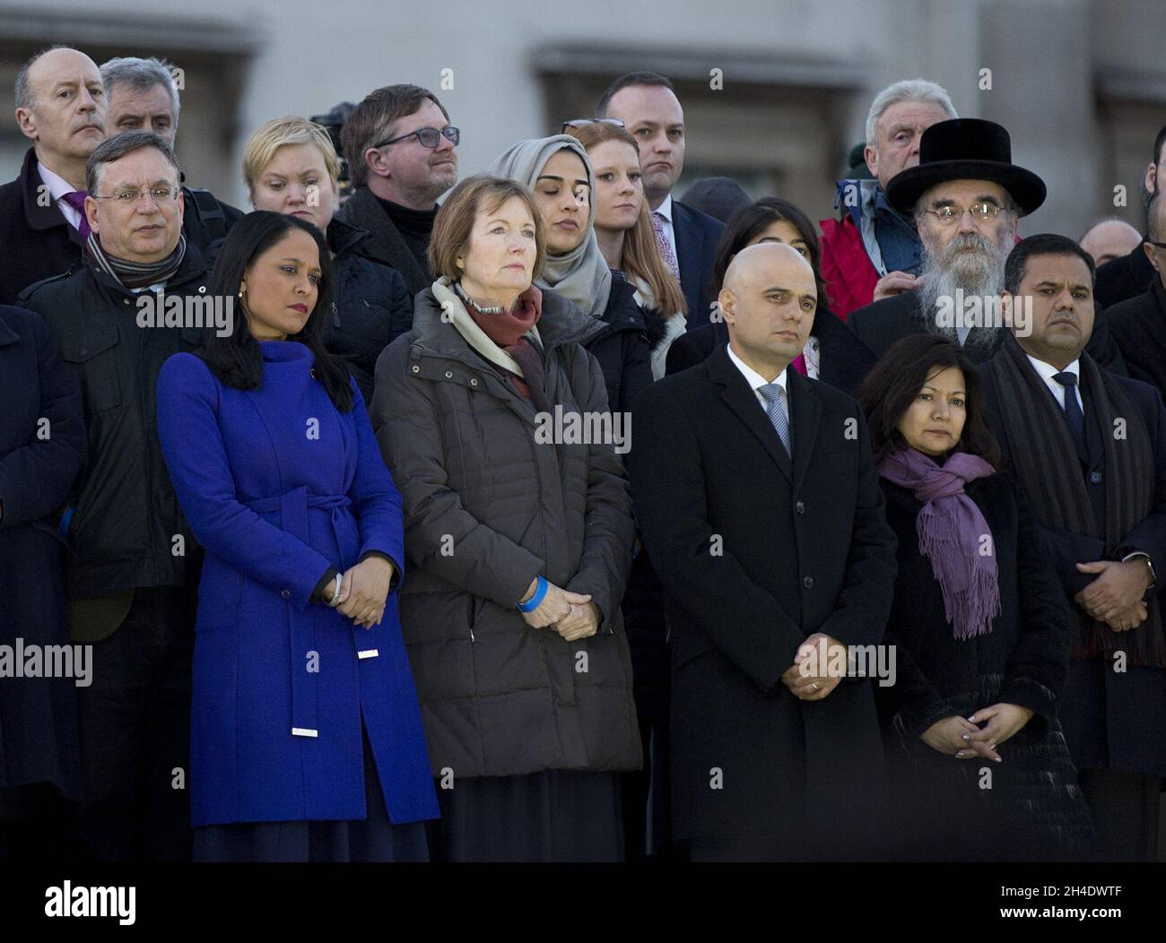 (left to right) Rushanara Ali, Harriet Harman, and Sajid Javid keep a minute of silence during a candlelit vigil in Trafalgar Square, London, to pay tribute to to the London attack victims. Picture dated: Thursday March 23, 2017. Photo credit should read: Isabel Infantes / EMPICS Entertainment. Stock Photo