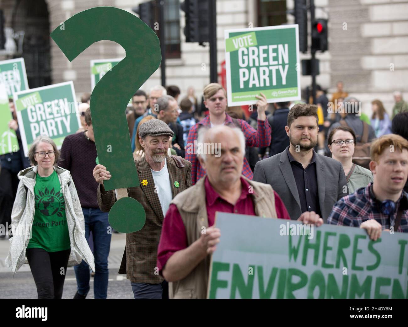 Green Party activists take a giant Green question mark to Parliament Square, London, where co-leader Caroline Lucas gave a speech to highlight the environment issue within the national debate in the General Election campaign. Picture dated:  Tuesday May 30, 2017. Photo credit should read: Isabel Infantes / EMPICS Entertainment. Stock Photo