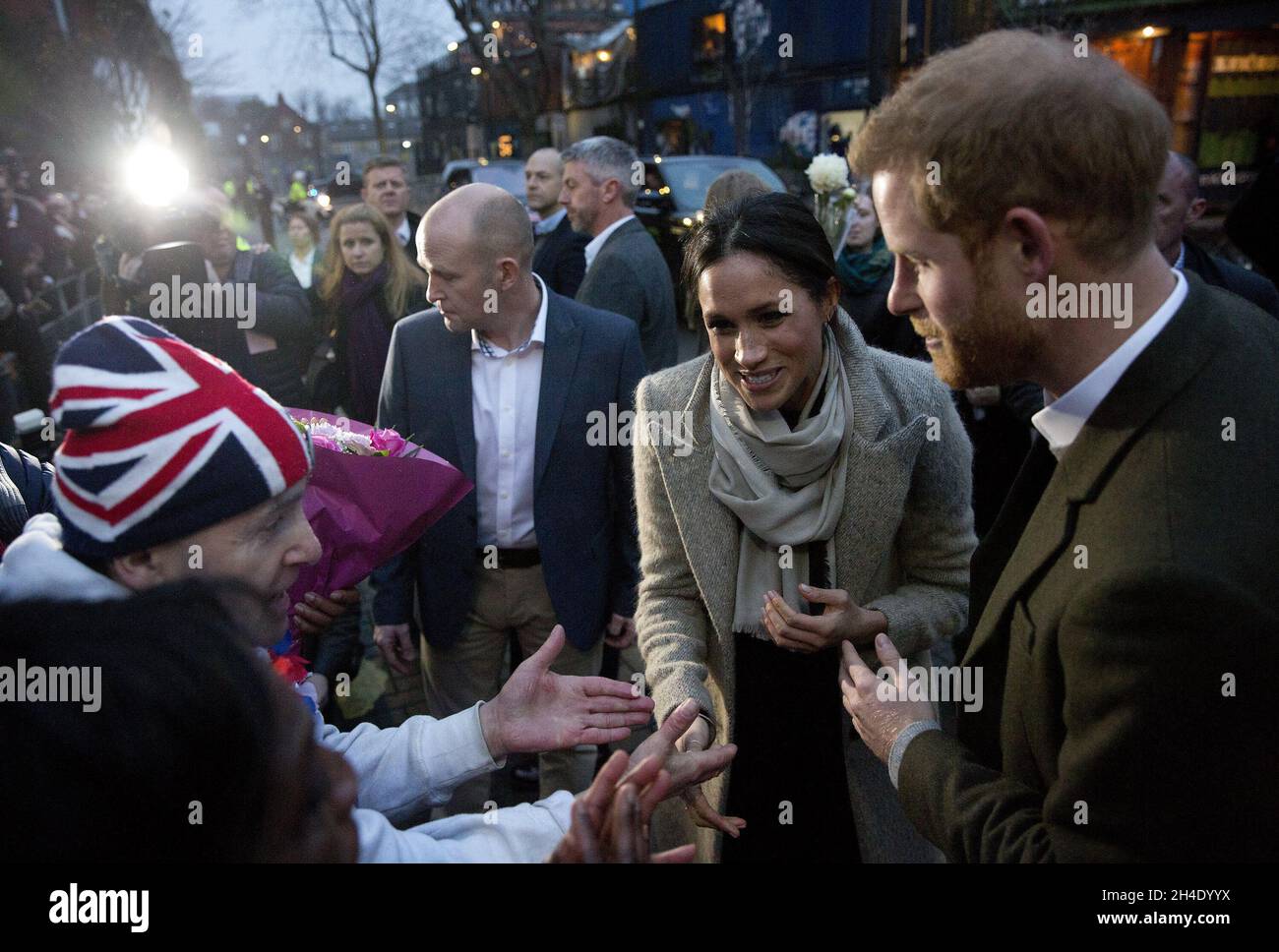 Prince Harry and his fiancee Meghan Markle speak with well wishers as they leave Reprezent 107.3FM radio station in Brixton, London. Picture dated: Tuesday January 9, 2018. Photo credit should read: Isabel Infantes / EMPICS Entertainment. Stock Photo
