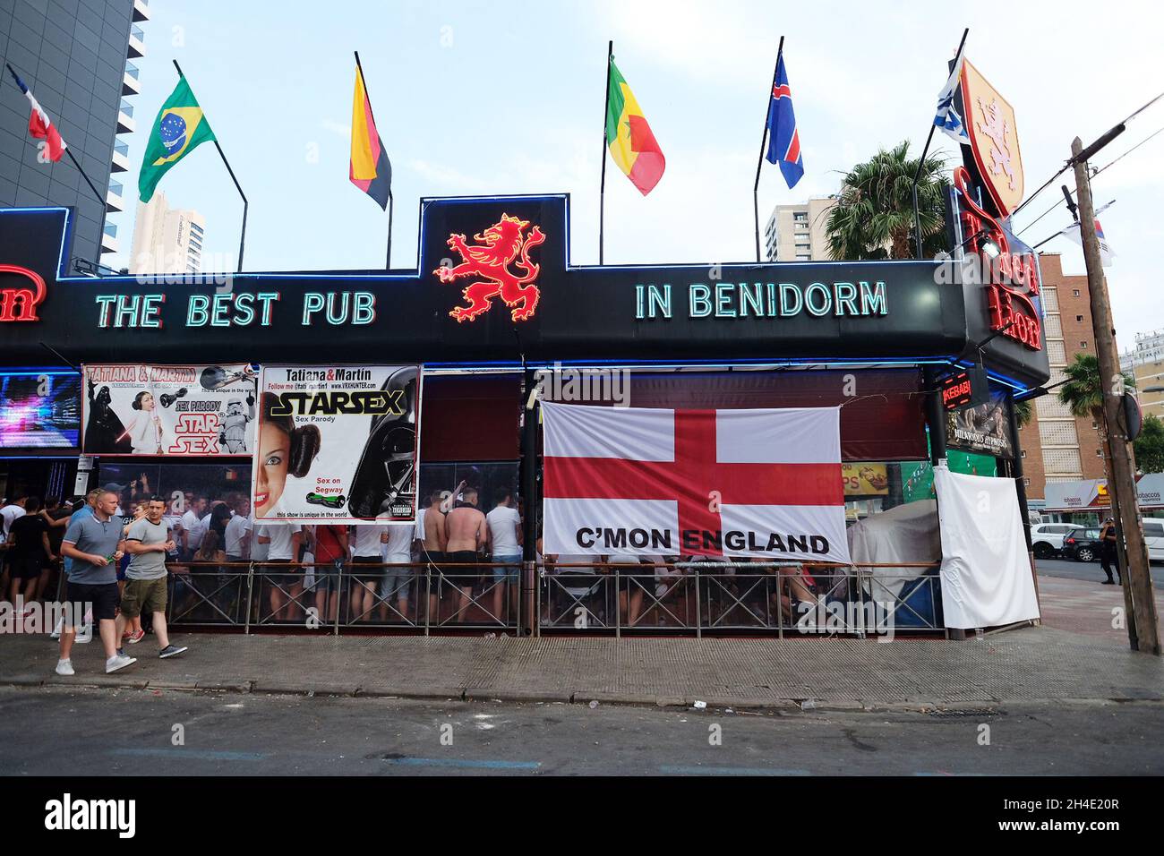 St George's cross flag hangs from a The Red pub in Benidorm, as British expats and tourists fill the pubs to the FIFA World Cup 2018 football game