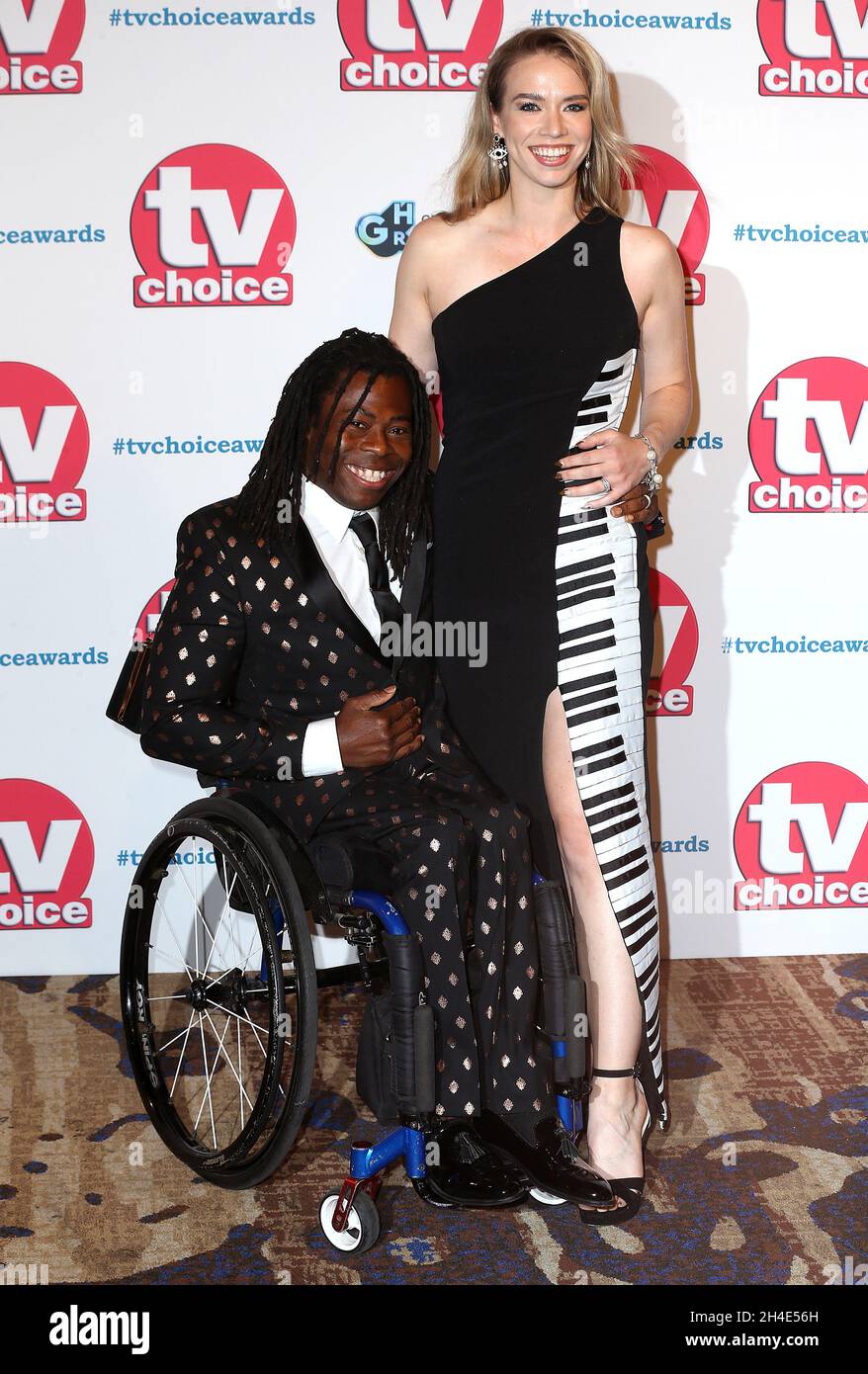 Ade Adepitan (left) and Linda Harrison attending the TV Choice Awards held at the Hilton Hotel, Park Lane, London Stock Photo