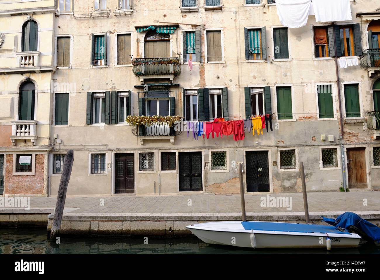 Apartments along canal in Venice Italy Stock Photo
