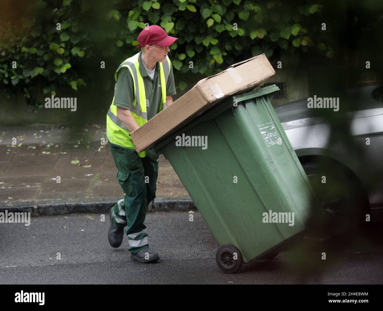 Islington council refuse collectors clear the recycling bins from local