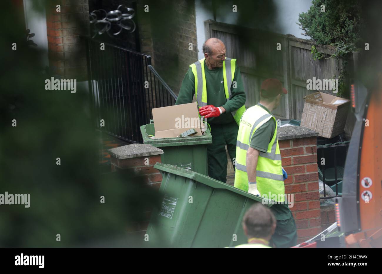 Islington council refuse collectors clear the recycling bins from local