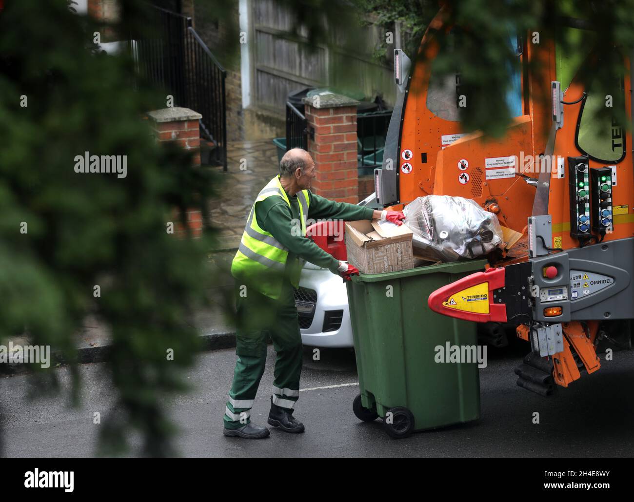 Islington council refuse collectors clear the recycling bins from local