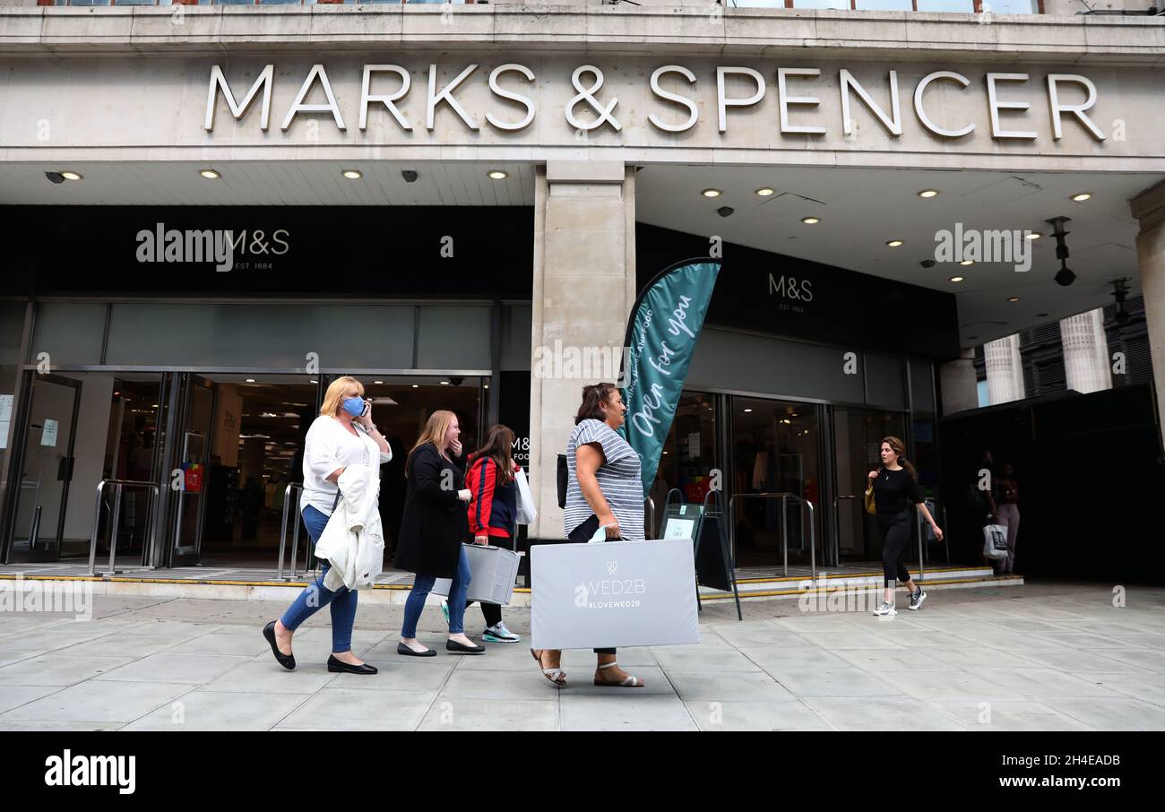 Shoppers outside a Marks and Spencer branch on Oxford Street, London as the  retailer has said 950 jobs are at risk as part of plans to reduce store  management and head office