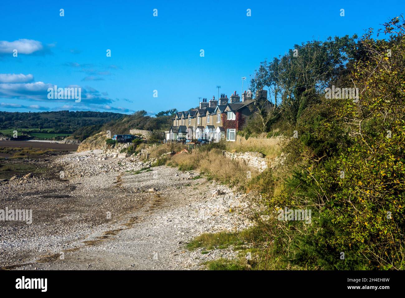 Terraced houses overlook the beach at Silverdale, Lancashire Stock