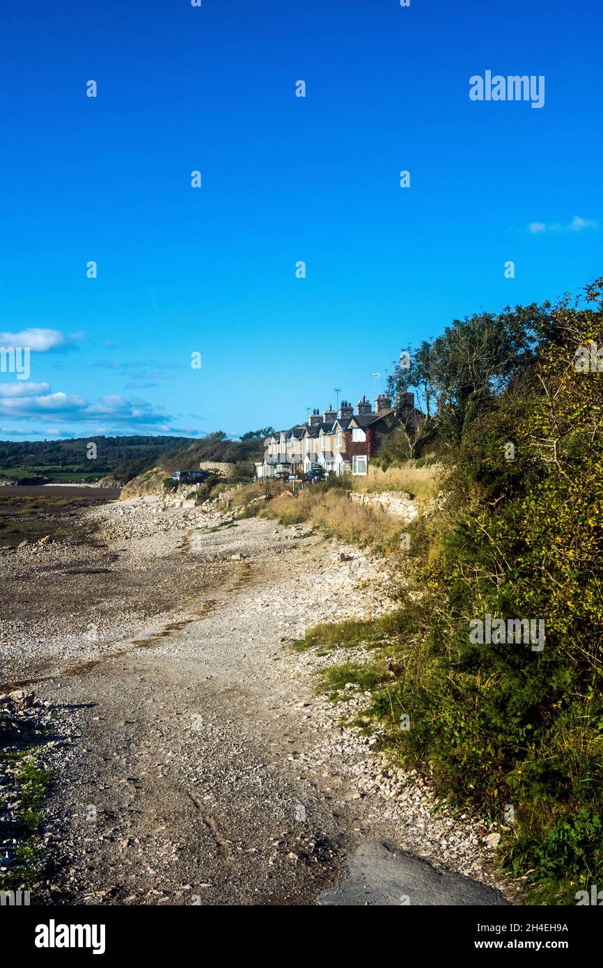 Terraced houses overlook the beach at Silverdale, Lancashire Stock