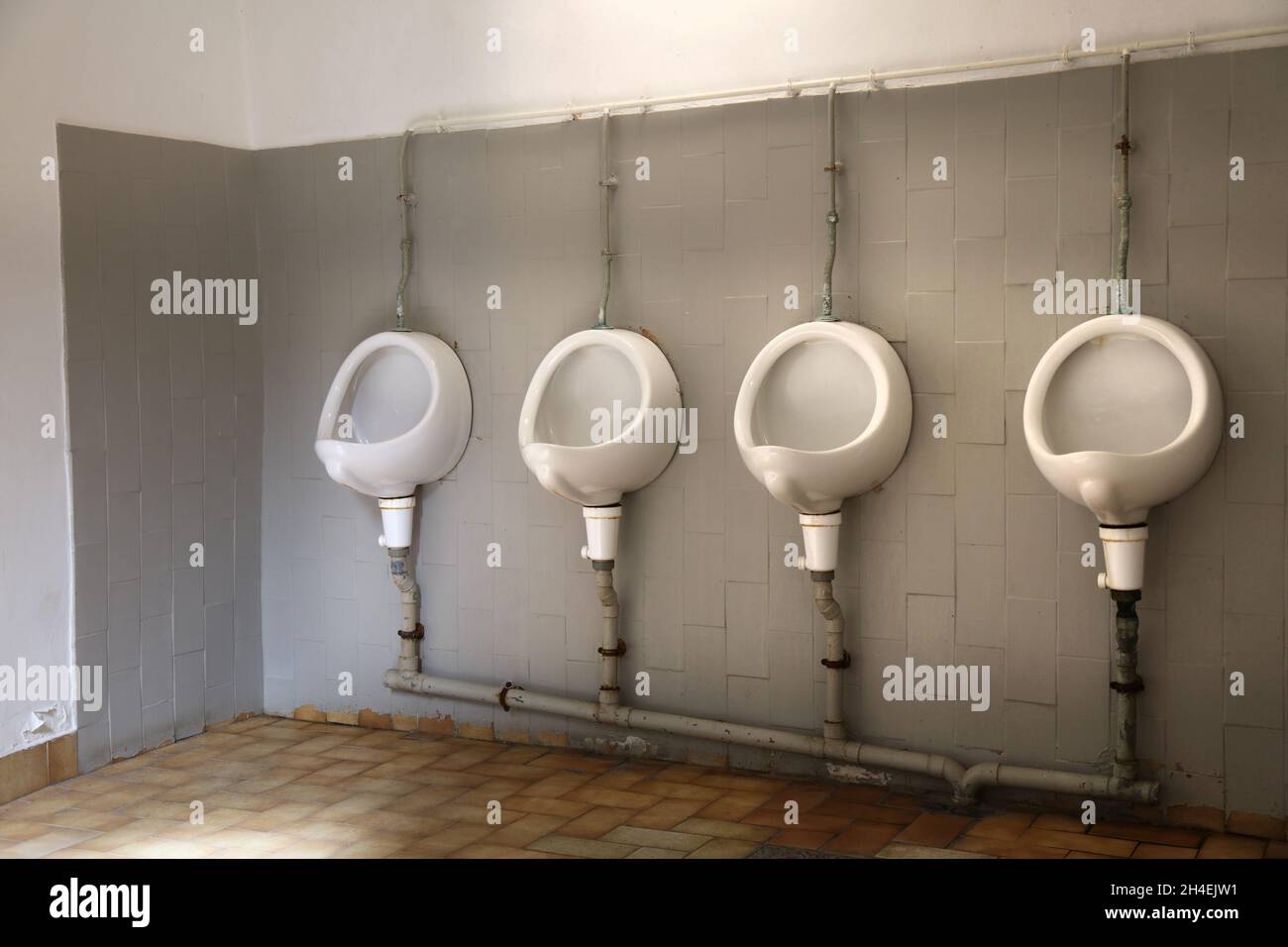 Public toilet urinals in France. Public toilet typical for Europe Stock