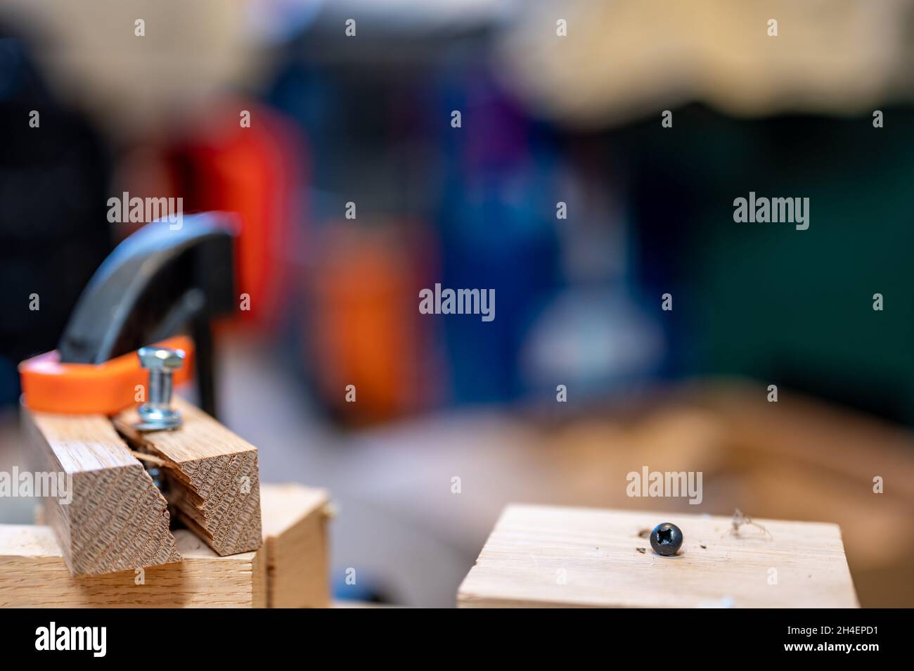 Selective focus on cracked and split wood from not drilling a pilot