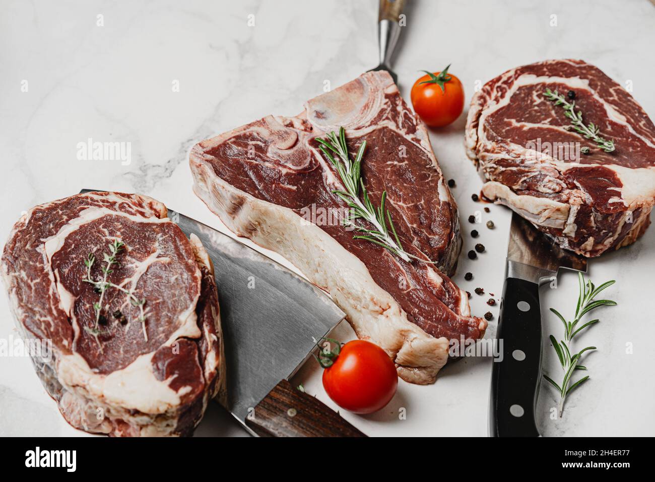 aged black angus beef steak ready to roast and serve. Stock Photo
