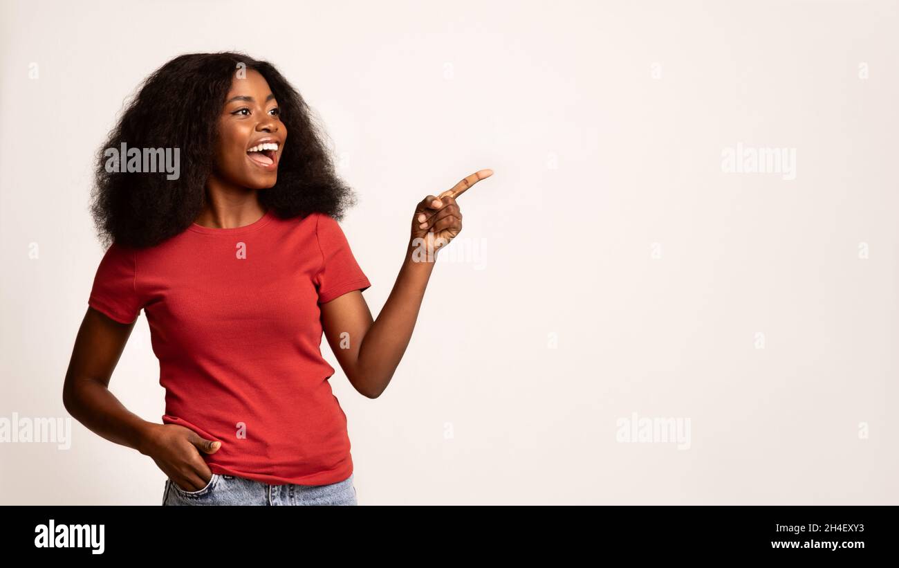 Emotional black woman pointing hi-res stock photography and images - Alamy