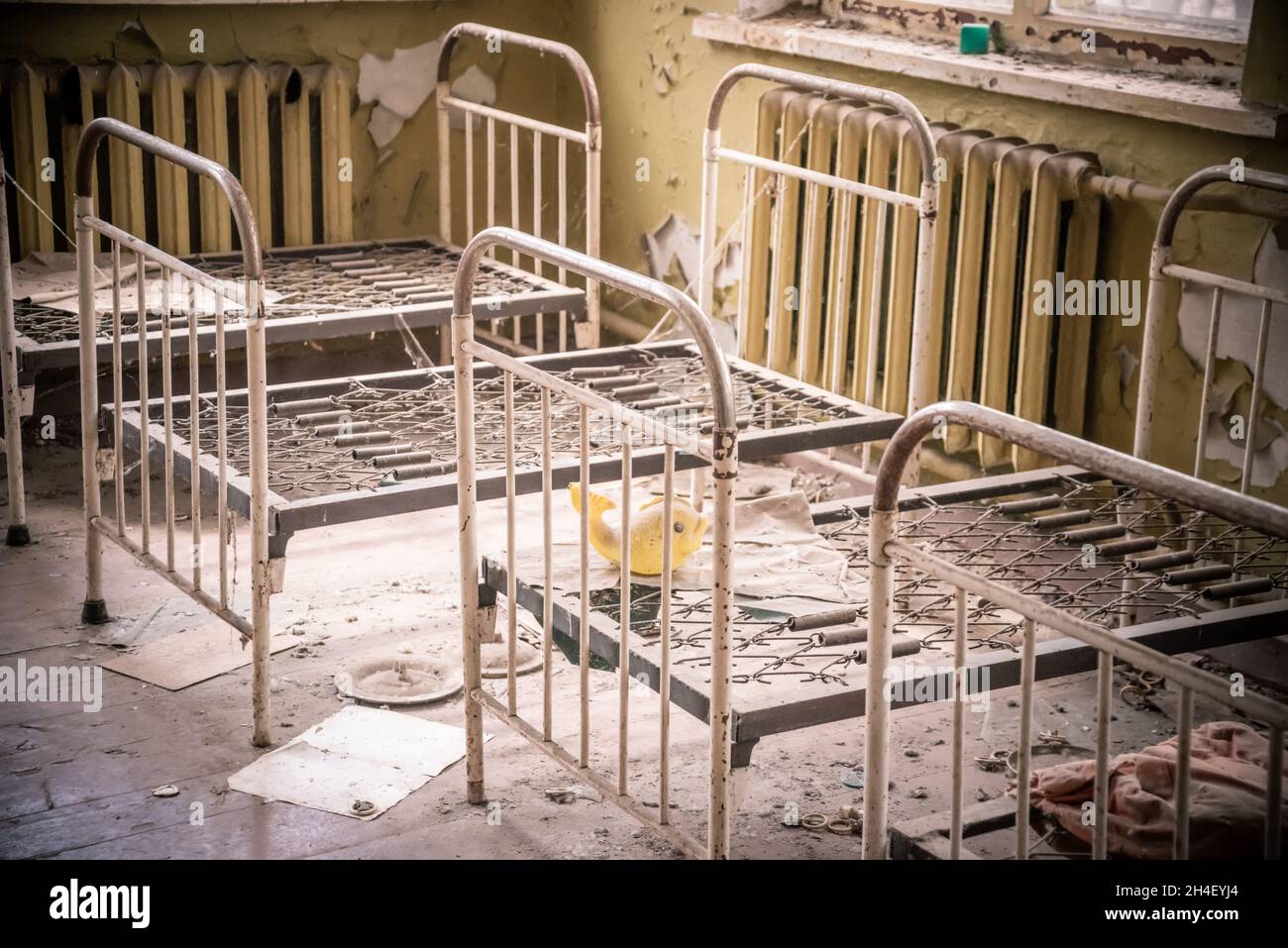 Bedroom in abandoned kindergarten Cherrnobyl zone, Ukraine Stock Photo