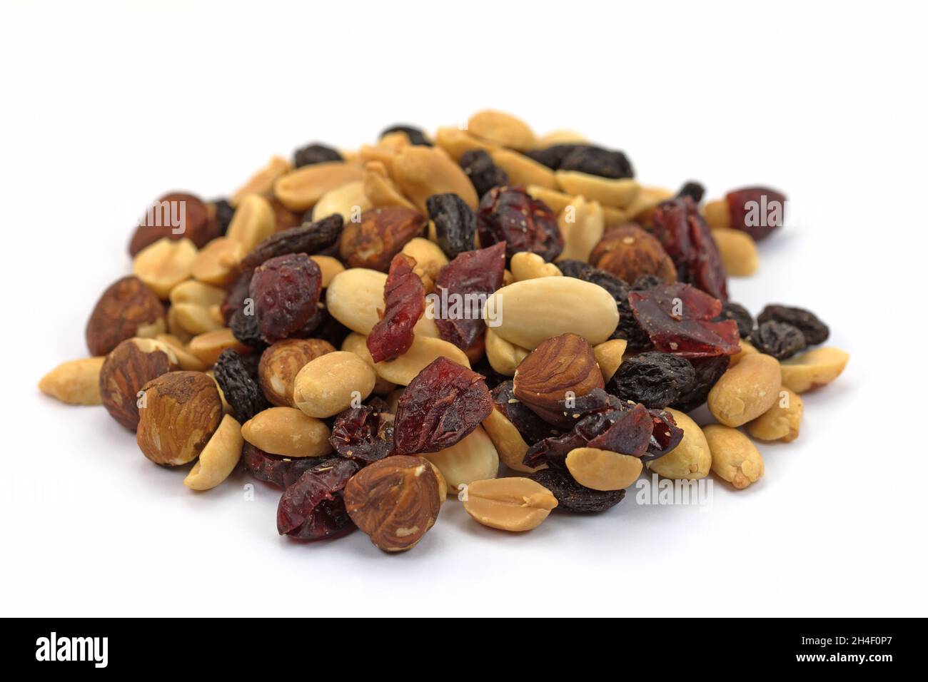 Various nuts and raisins against white background Stock Photo