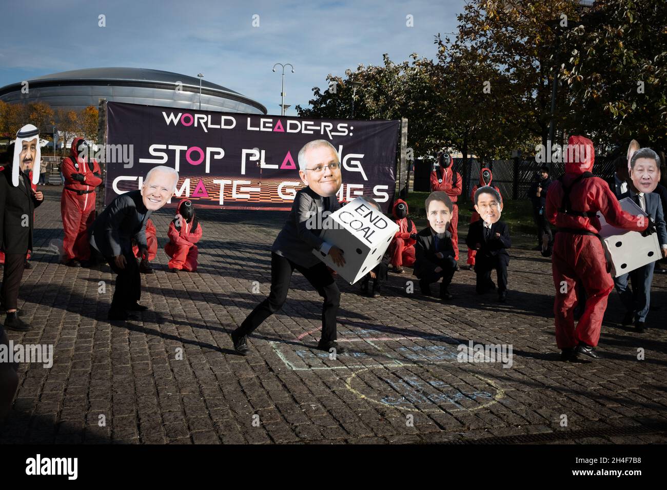 Glasgow, UK. Extinction Rebellion ‘Squid Game’ themed protest, telling world leaders not to play games at the 26th UN Climate Change Conference, known as COP26, in Glasgow, Scotland, on 2 November 2021. Photo: Jeremy Sutton-Hibbert/Alamy Live News, Stock Photo