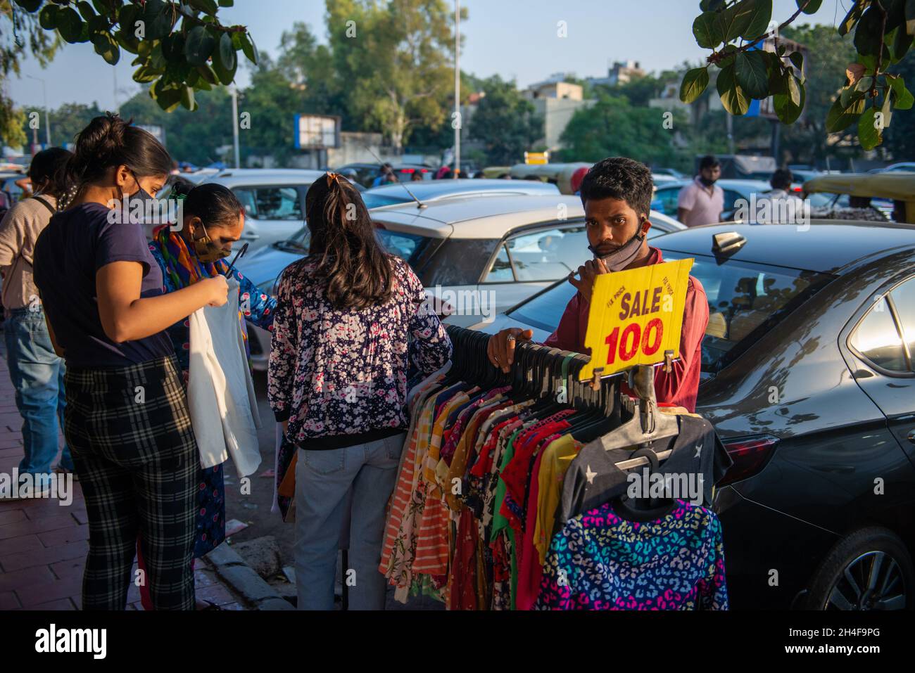 New Delhi, IndiaOct 31 2021 People shopping clothes from street vendors at Lajpat Nagar Market