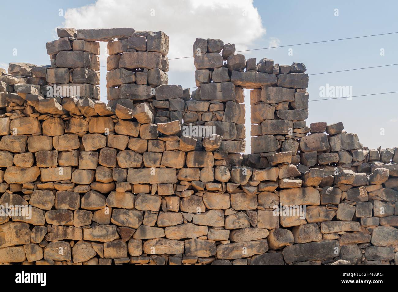 Ruins of Qasr al-Azraq Blue Fortress , fort located in the desert of ...