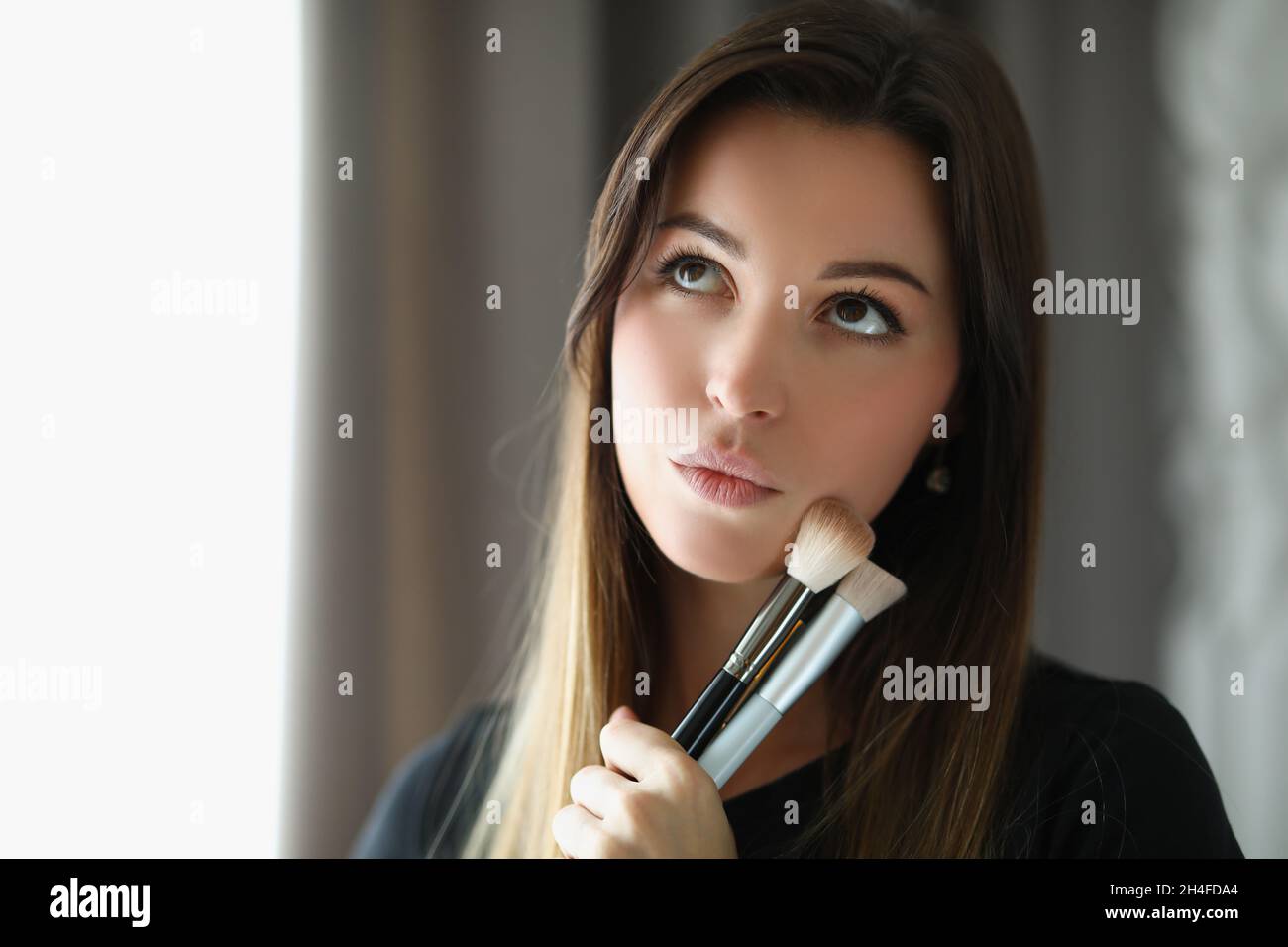 Brunette worker in room Stock Photo