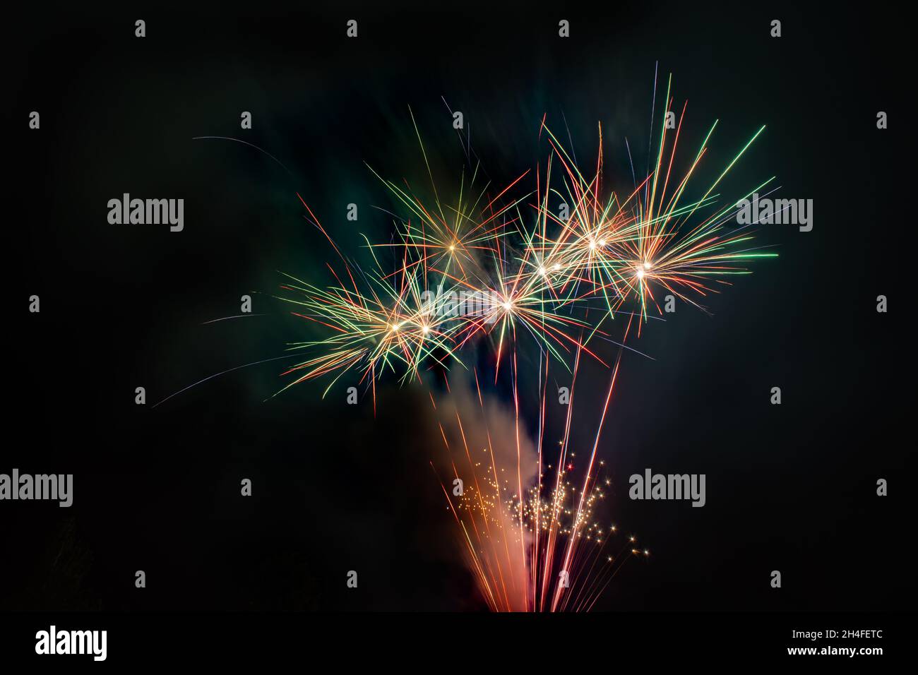 Colorful Fireworks, red and green, long exposure, horizontal format Stock Photo