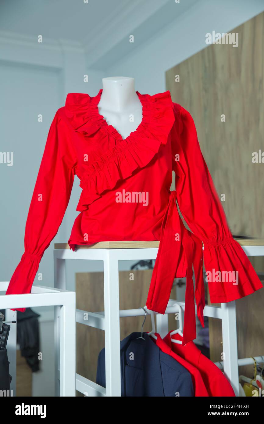 red shirt Trendy red blouse Summer blouse. A elegant female red summer blouse on mannequin white model Fashionable red blouse woman over Stock Photo Alamy