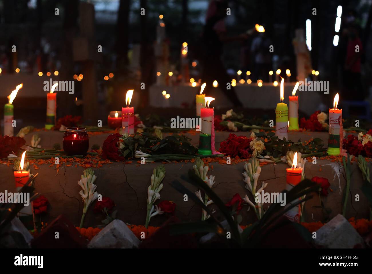 Dhaka, Bangladesh. 02nd Nov, 2021. Candle lights and flowers for the