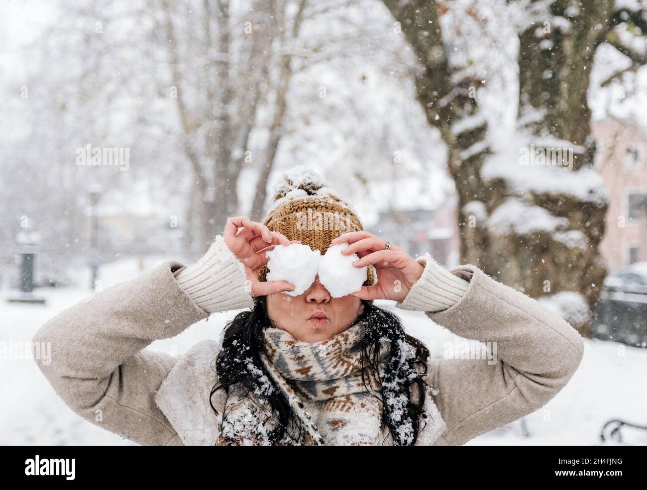 Woman wearing warm clothing layers hi-res stock photography and
