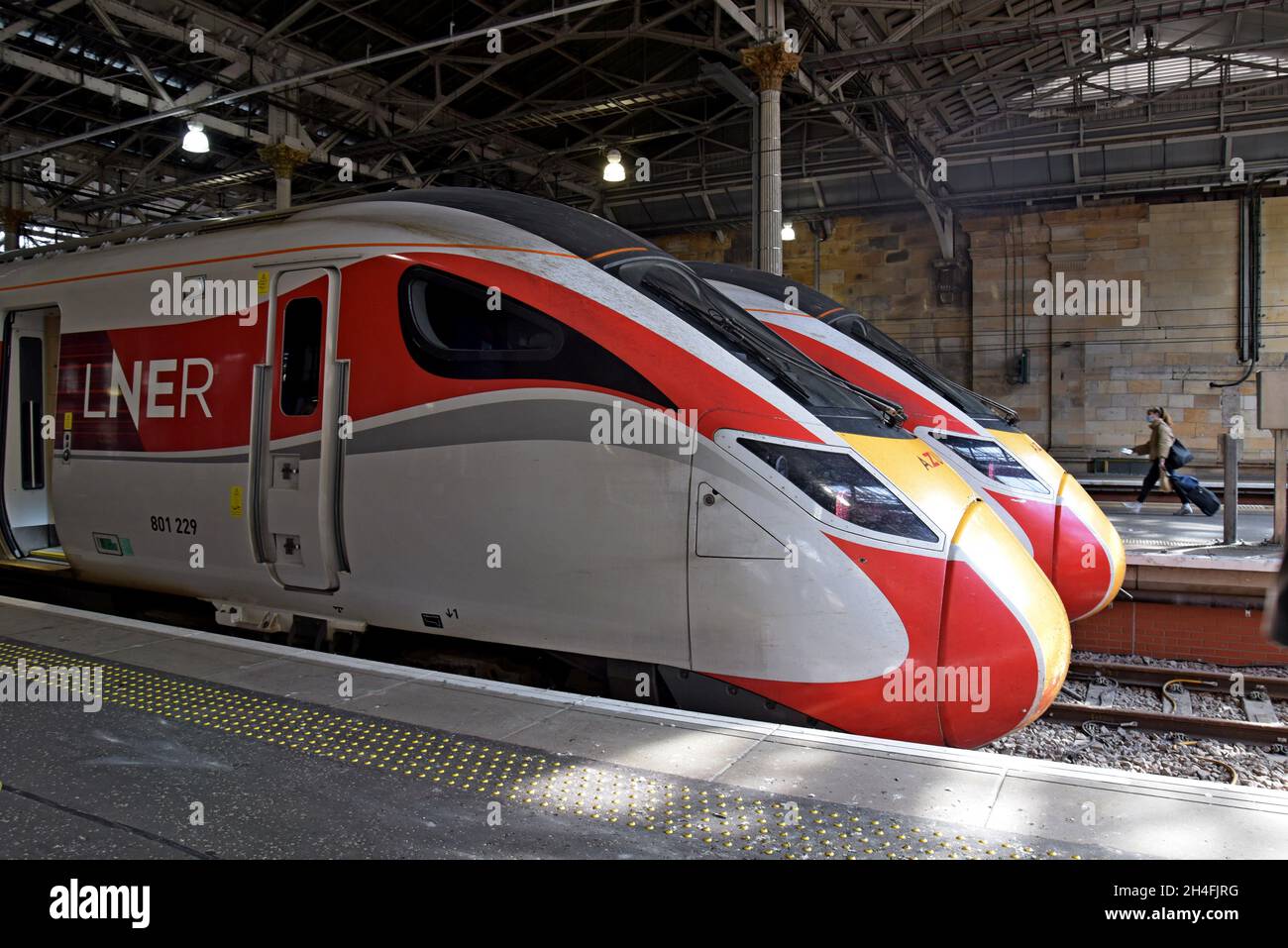 A pair of LNER Railway 800 Class Azuma electric trains at Edinburgh Waverley Railway Station, Scotland, Sept 2021 - Stock Image