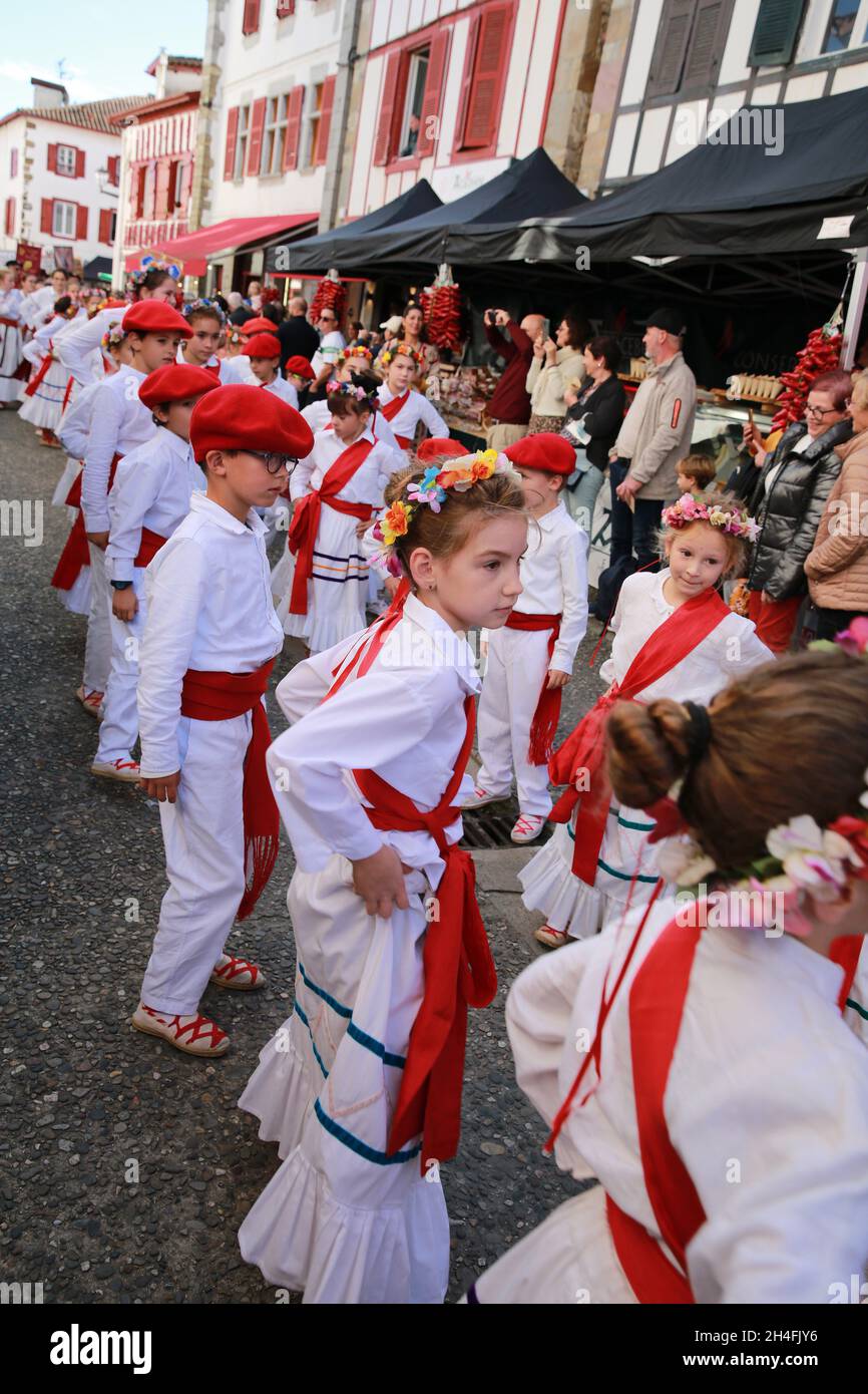 Children doing the Basque traditional dancing in the streets of Espelette, Pays  Basque, Pyrenees- Atlantique, France Stock Photo - Alamy