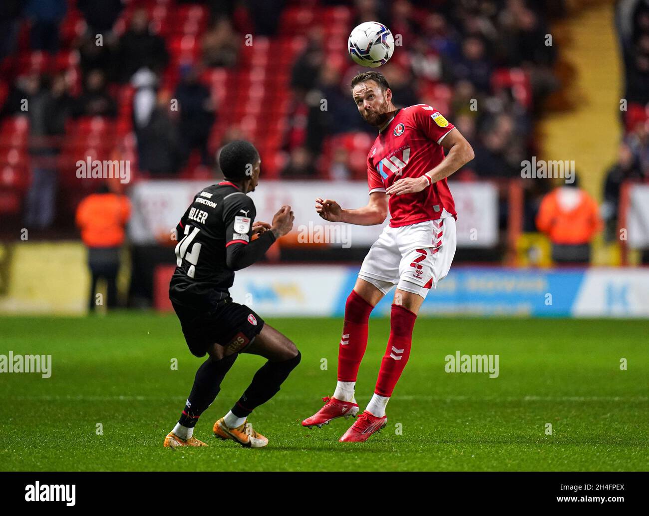 Rotherham United's Mickel Miller (left) and Charlton Athletic's Chris Gunter (right) battle for the ball during the Sky Bet League One match at The Valley, London. Picture date: Tuesday November 2, 2021. Stock Photo