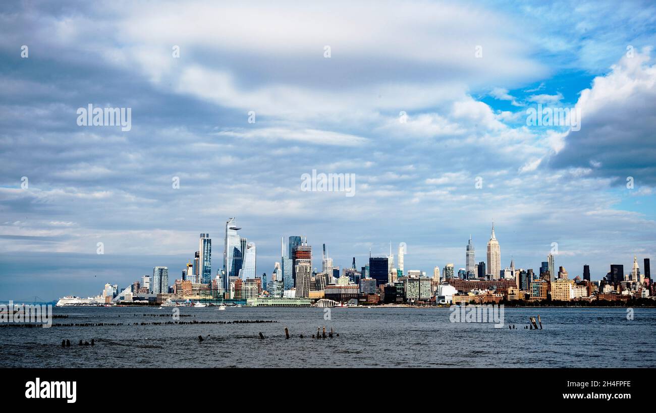 Dramatic cloudscape over Midtown Manhattan skyline. Stock Photo