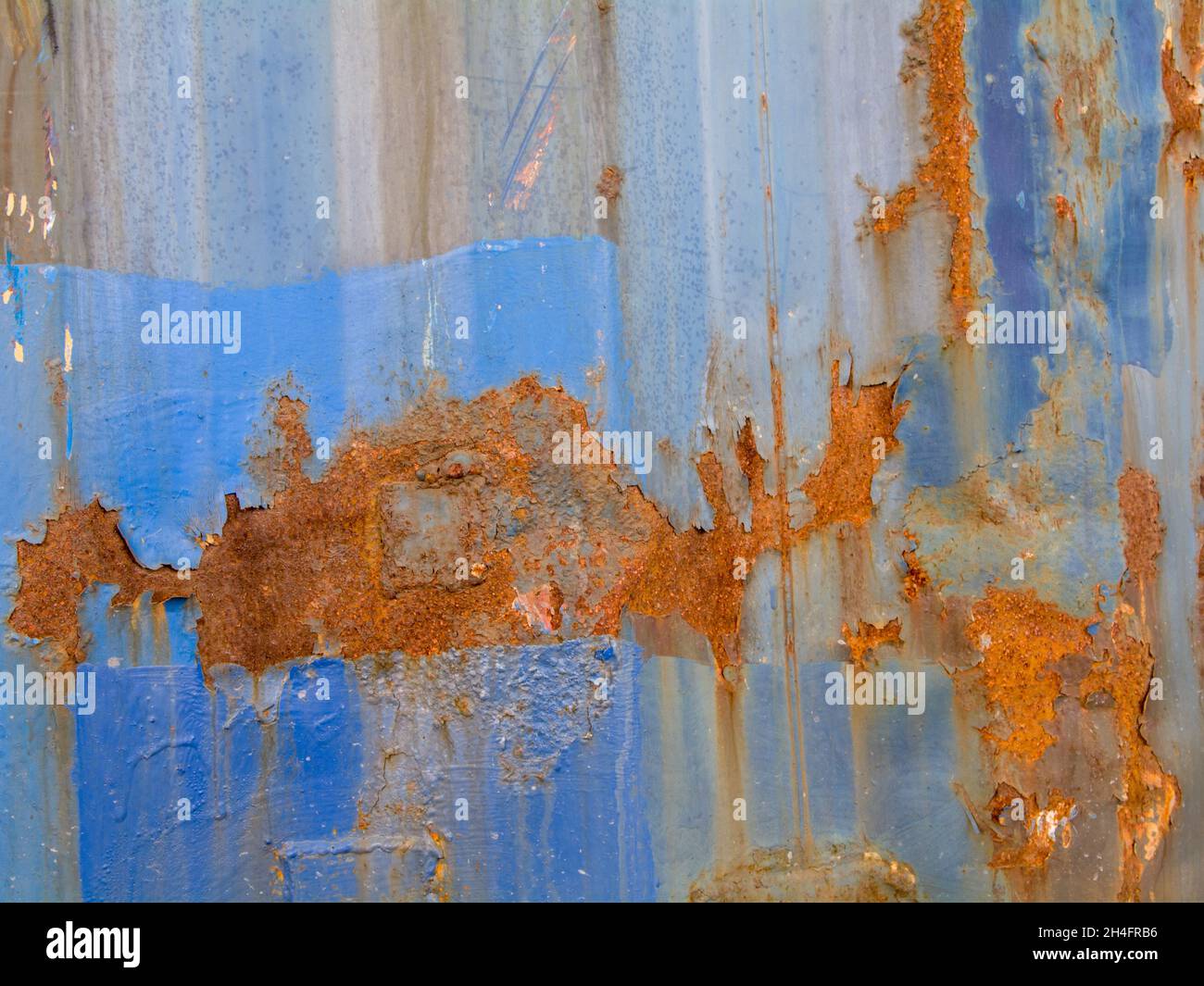 Detailed surface of rusted blue metal beam Stock Photo