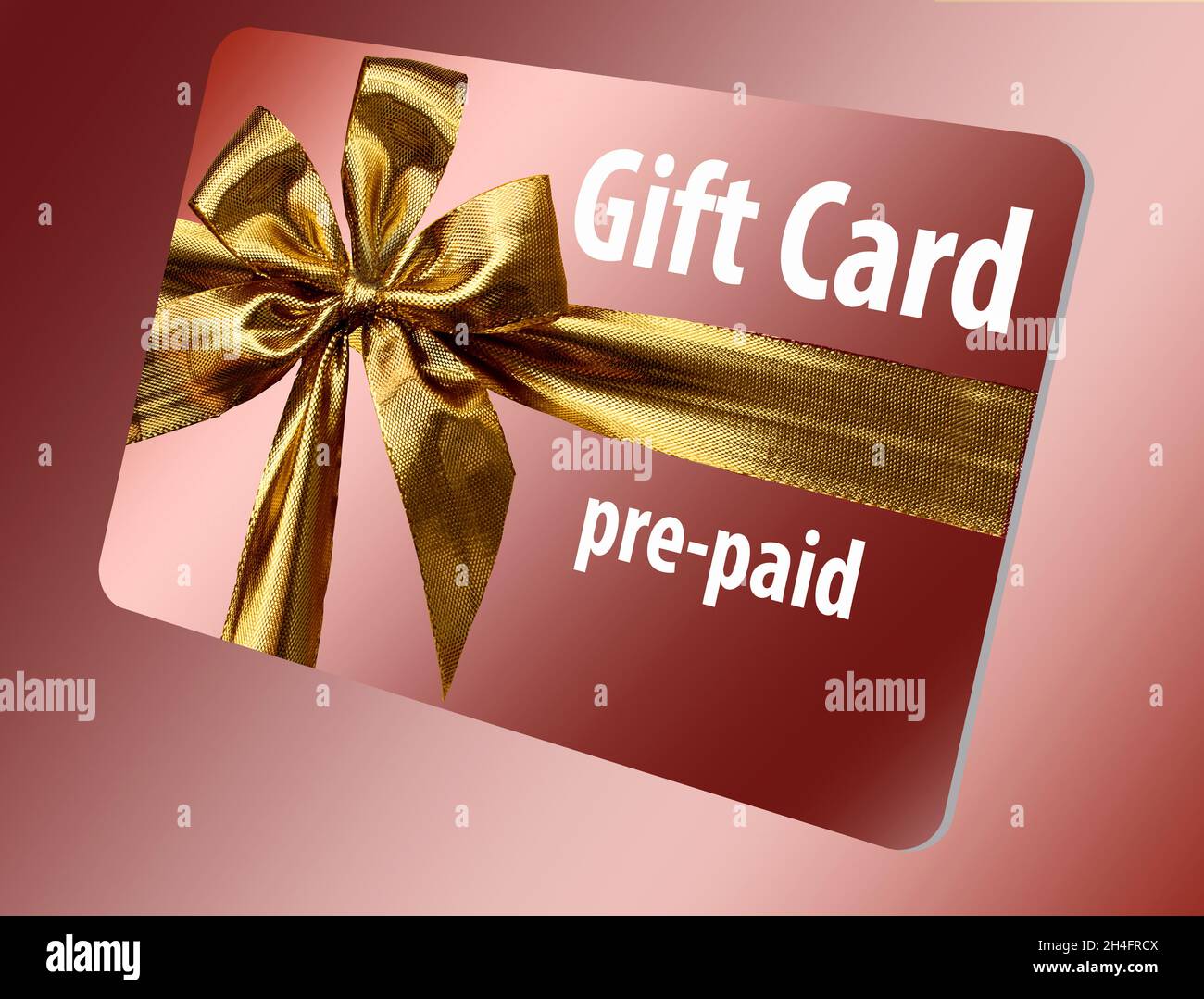 A Pre paid Gift Card Is Seen Here It Is Gold With A Gold Ribbon Design
