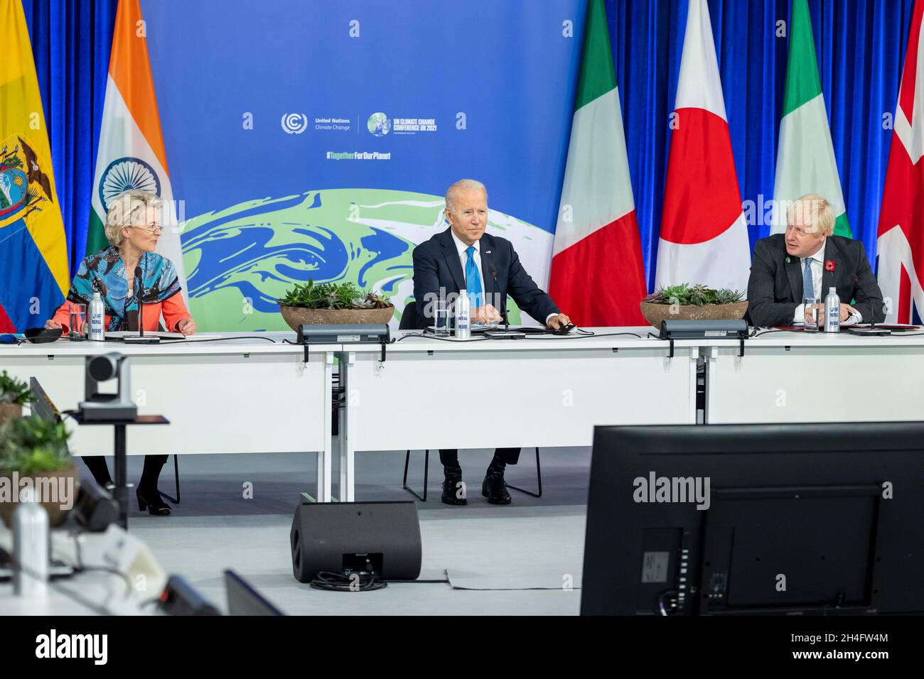 Glasgow, United Kingdom. 02nd Nov, 2021. U.S President Joe Biden with President of the European Union Commission Ursula von der Leyen, left, and British Prime Minister Boris Johnson, right, during a breakout session on the second day of the COP26 U.N. Climate Summit at the Glasgow Science Centre November 2, 2021 in Glasgow, Scotland.Credit: Adam Schultz/White House Photo/Alamy Live News Stock Photo