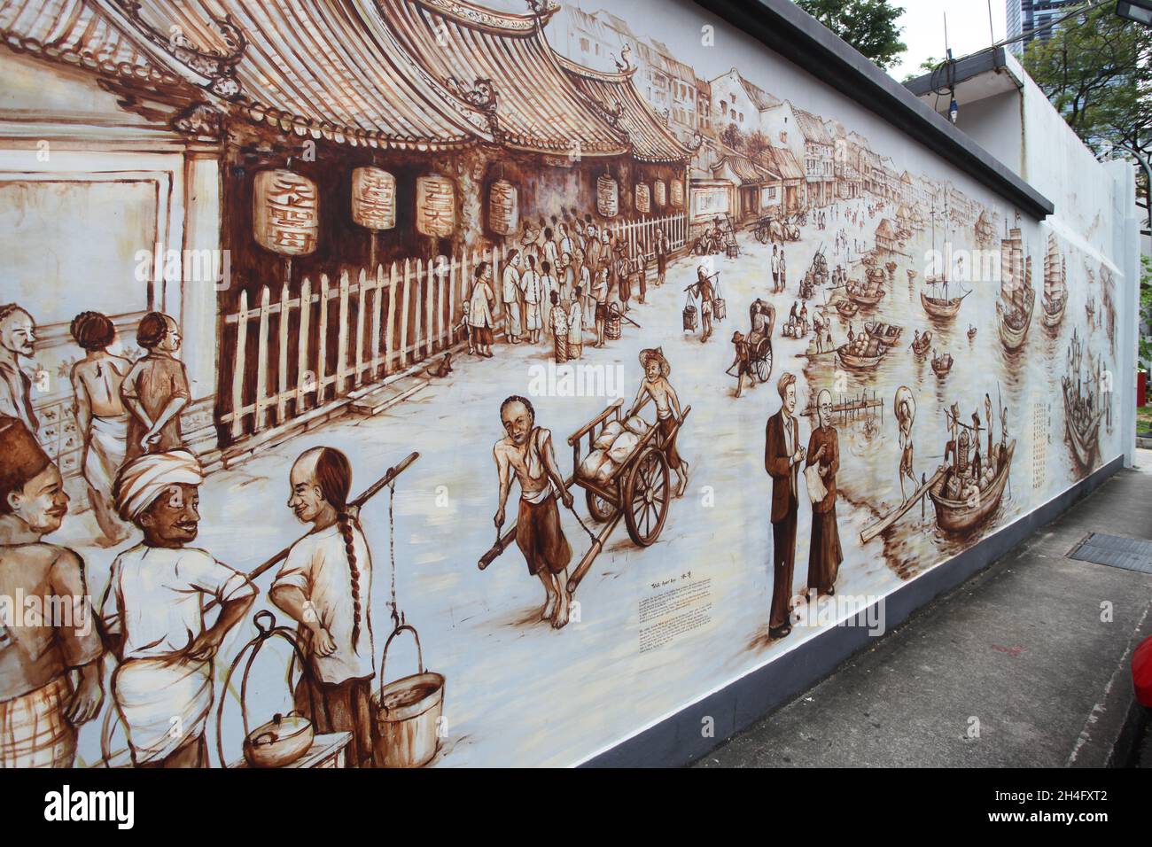 Thian Hock Keng Mural: An Immigrant’s Story. This mural is painted on the external back wall of the Thian Hock Keng temple in Singapore's Chinatown. Stock Photo